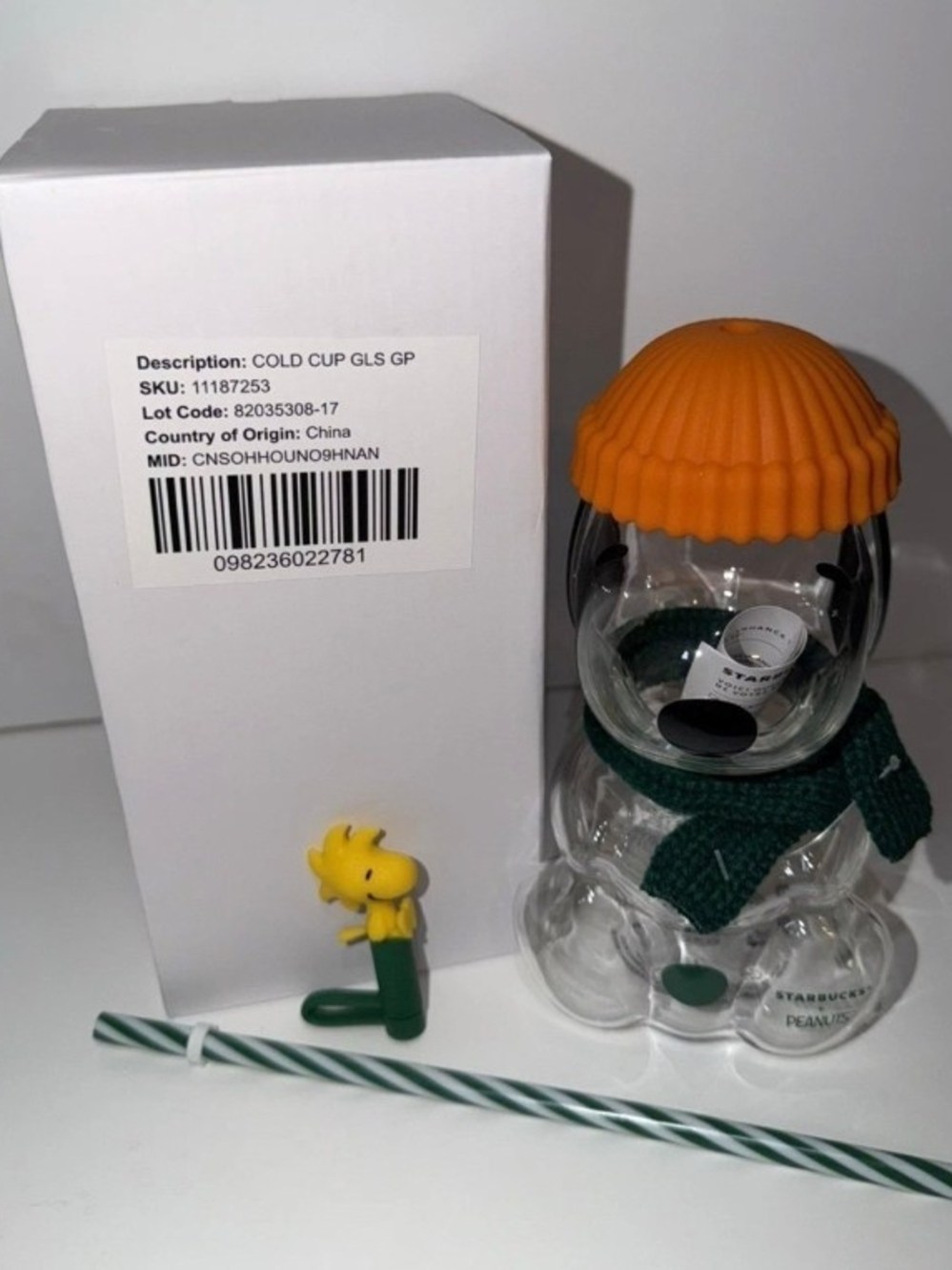 Starbucks Clear Glass Peanuts Snowman Cup with Orange Lid and Green Scarf